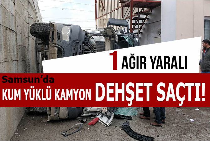 Kum yüklü kamyon istinat duvarından aşağı düştü: 1 ağır yaralı