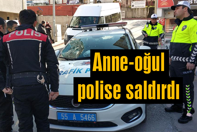 Sürücü polis aracının camını kırdı, annesi de bastonla polise saldırdı