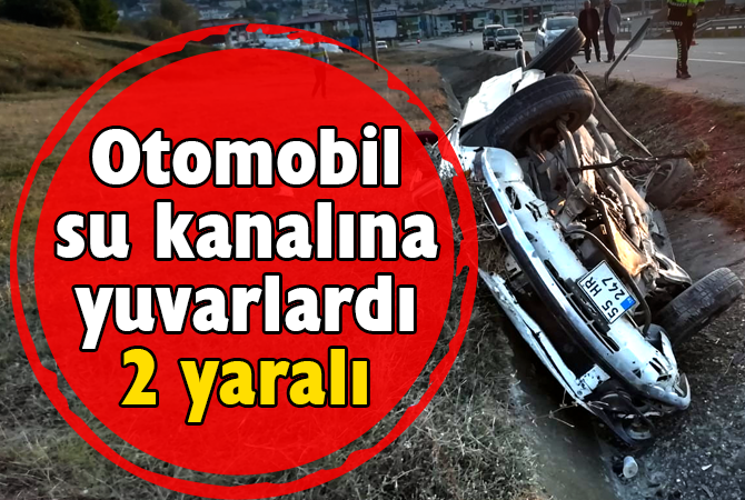 Otomobil su kanalına yuvarlardı: 2 yaralı