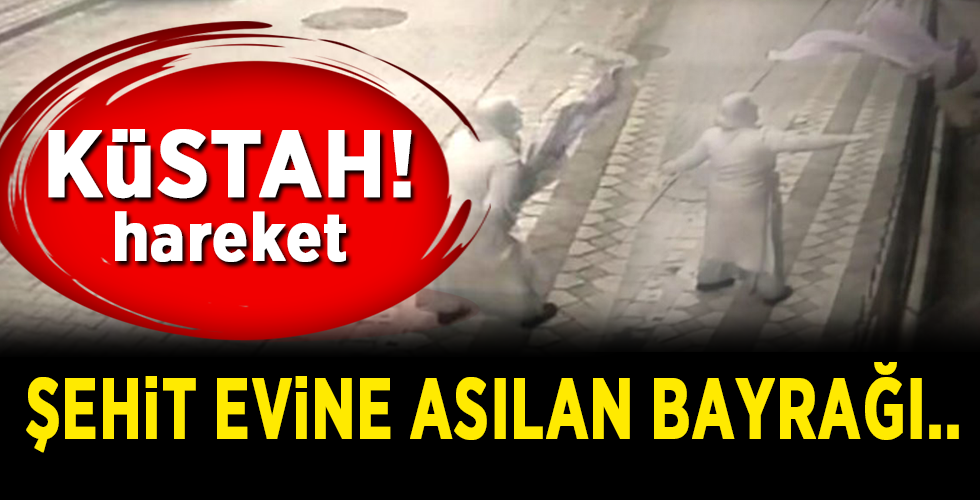 Şehit Esma Çevik’in babaevine asılan bayrağı yere atan kadın kamerada